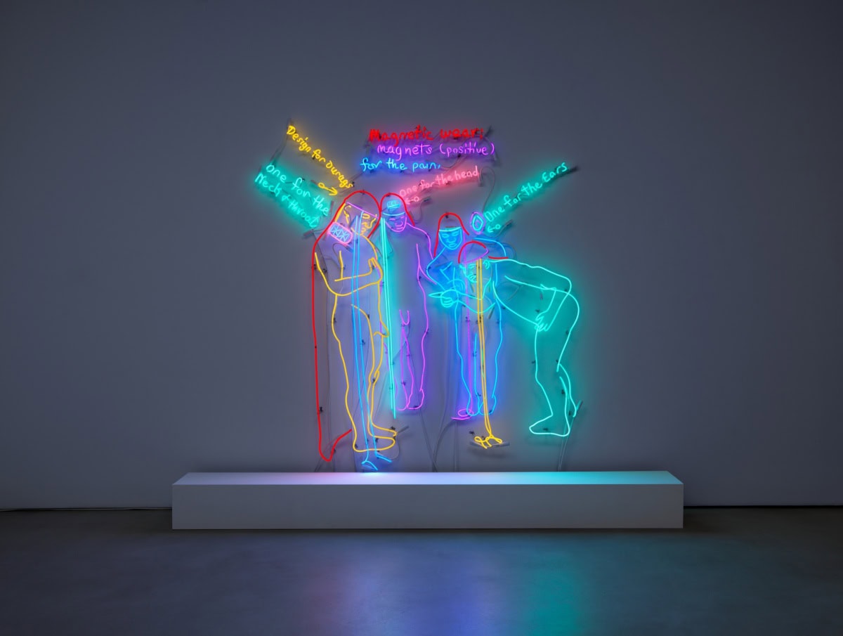 a neon sign of nude figures examining each other